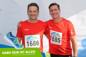 Teilnehmer vom Team Wintersport Gießübel vor der Fotowand beim Thüringer Wald Firmenlauf 2016 in der DKB-Ski-Arena Oberhof
